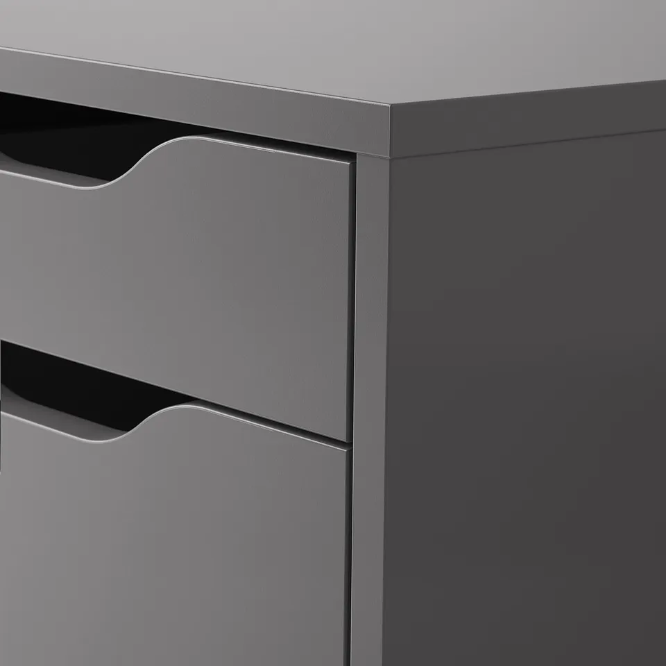 Close-up of modern, sleek, grey drawer unit with smooth finish and clean lines.