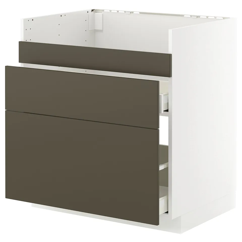 Modern METOD kitchen cabinet with dark brown drawers and white frame.