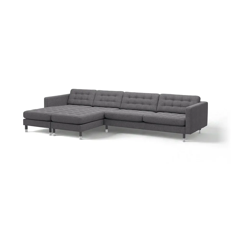 Modern grey l-shaped sofa with metal legs and tufted cushions.