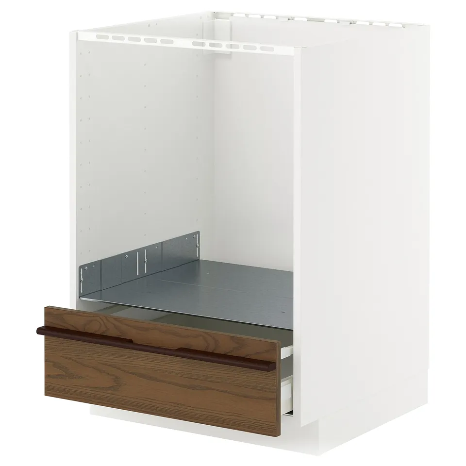 A white METOD kitchen cabinet with a dark brown stained ash veneer drawer. It a sturdy frame and a smooth-running drawer.