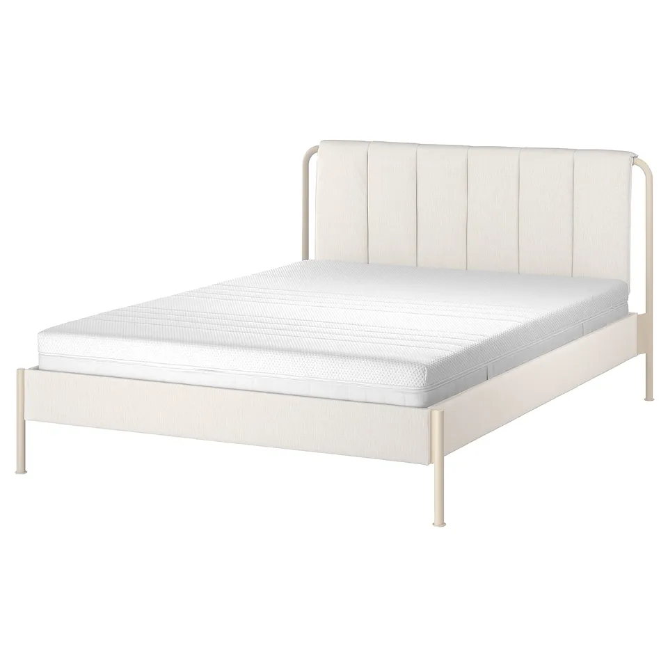 Modern bed: white TÄLLÅSEN with padded headboard, slim metal legs, striped upholstery.