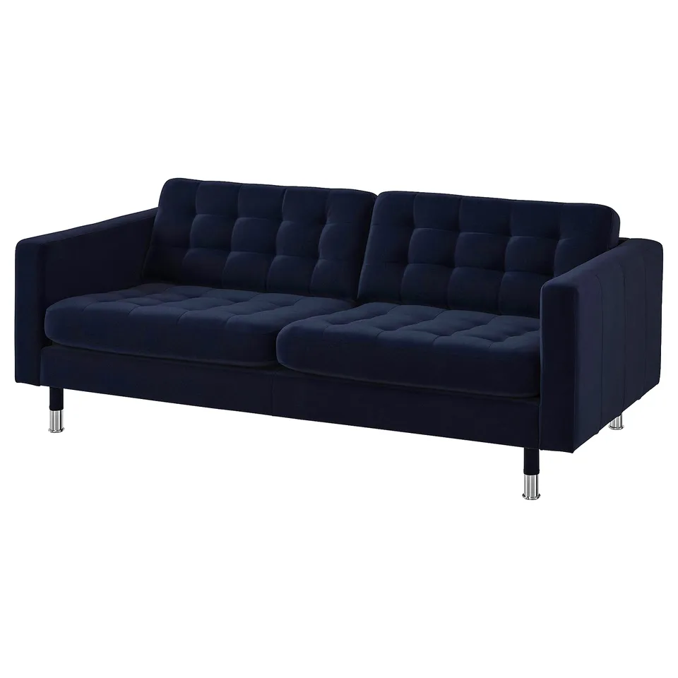 Modern dark blue velvet sofa with tufted seat and back, metal legs.