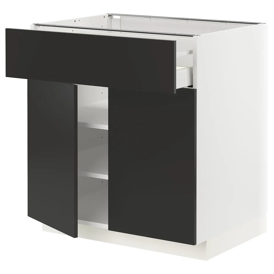Modern black and white METOD kitchen cabinet with open shelves and drawer.