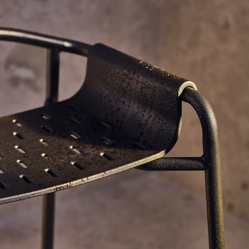 BÄSINGEN dark grey shower stool, made of polypropylene and steel, a perforated seat, non-slip feet, and sturdy armrests.