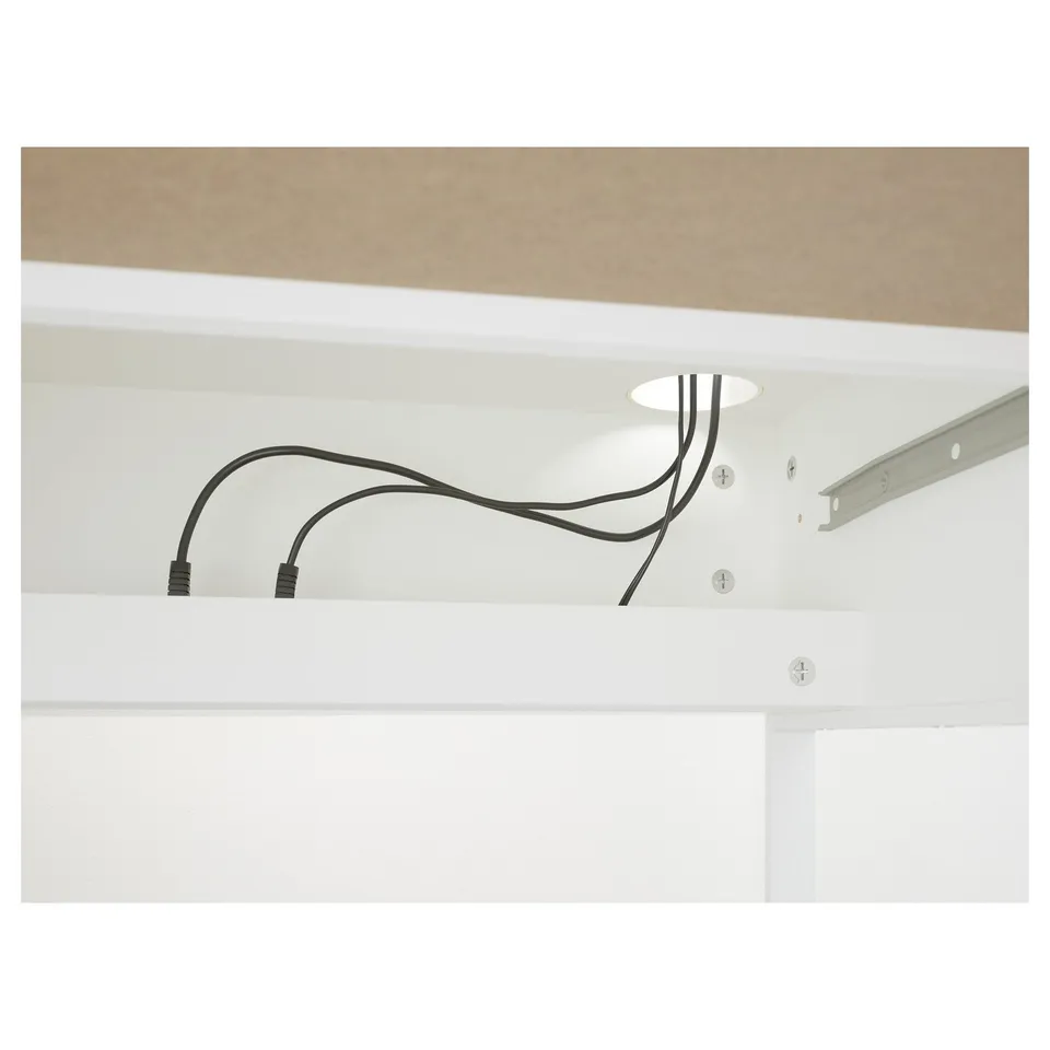 Under-shelf cable management with visible wiring.