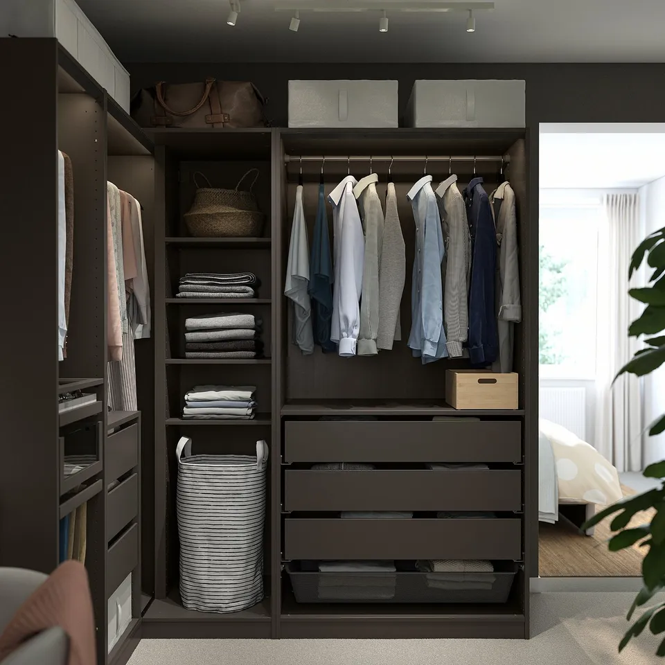 PAX closet with clothes, boxes, and shelves.