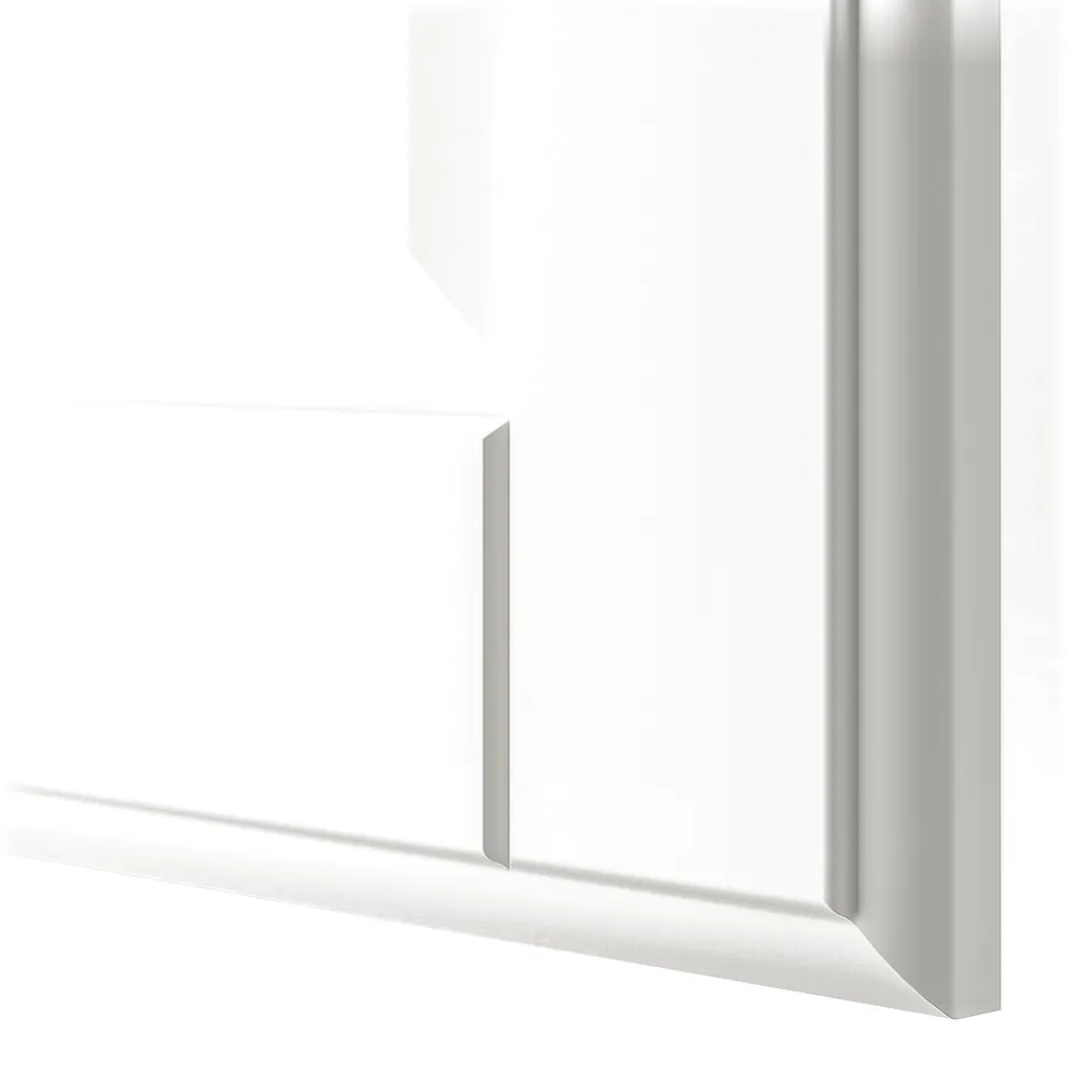 Clean, white cabinet door with smooth edges in close-up. Soft-closing hinge visible.