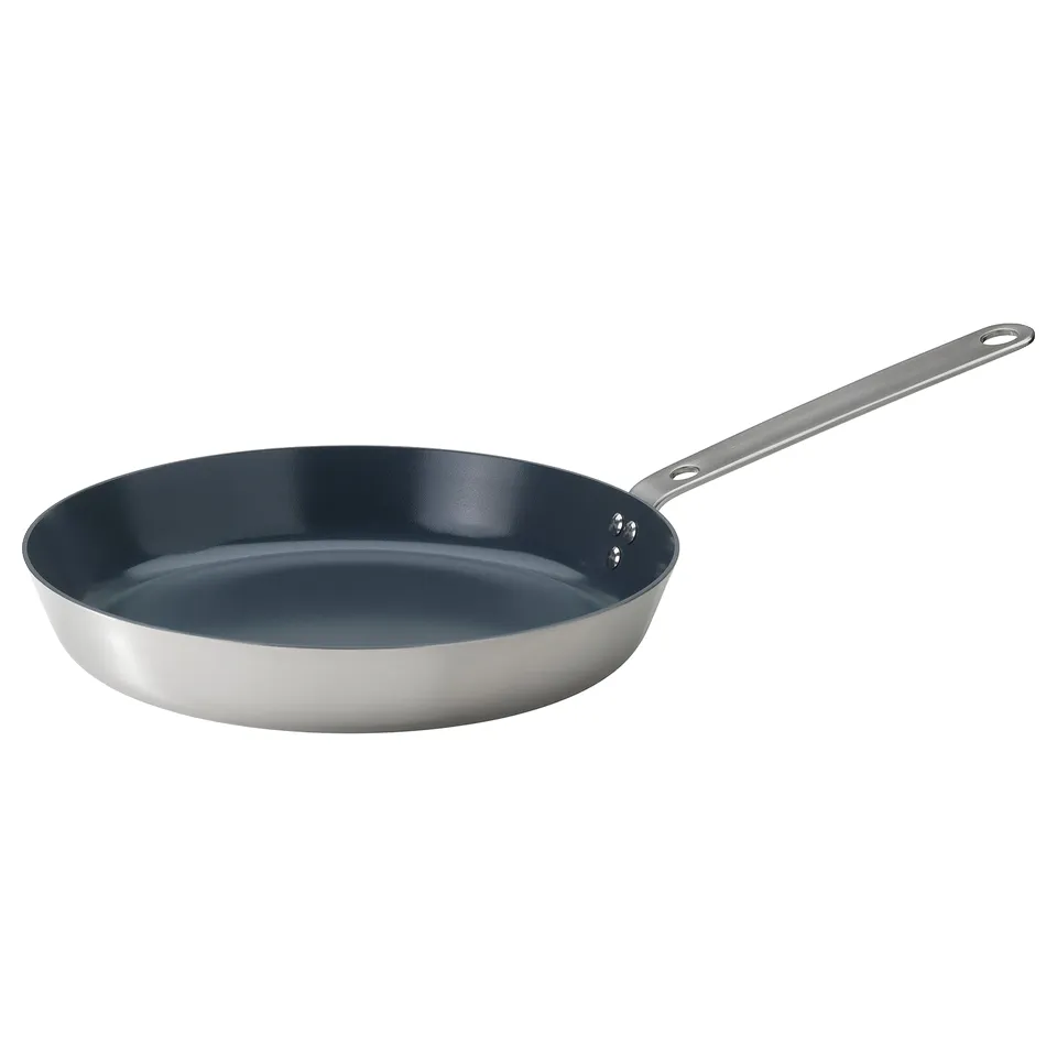 HEMKOMST stainless frying pan, dark blue non-stick interior, round shape, long handle.