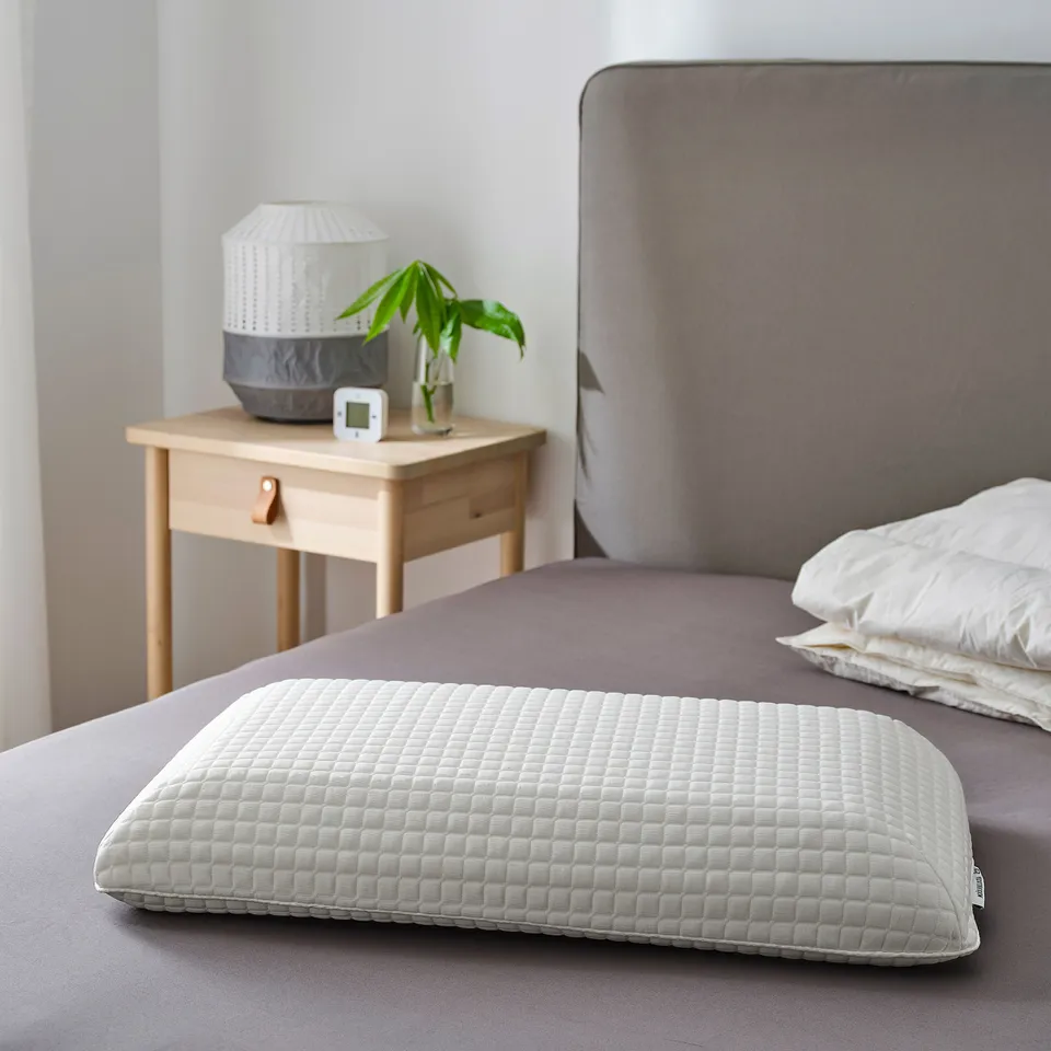part: MJÖLKKLOCKA ergonomic pillow, side/back sleeper