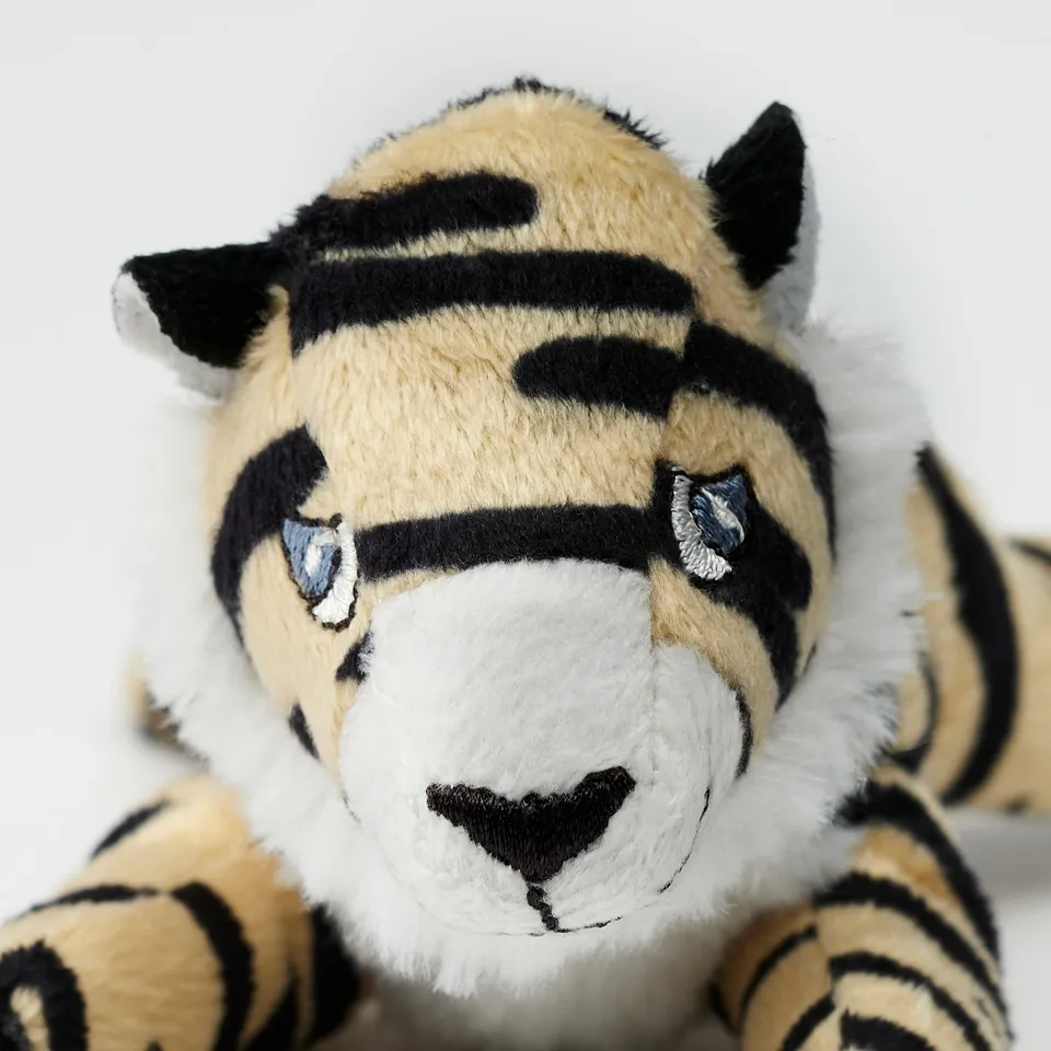 Plush tiger toy, soft quality, with detailed stripes & embroidered.