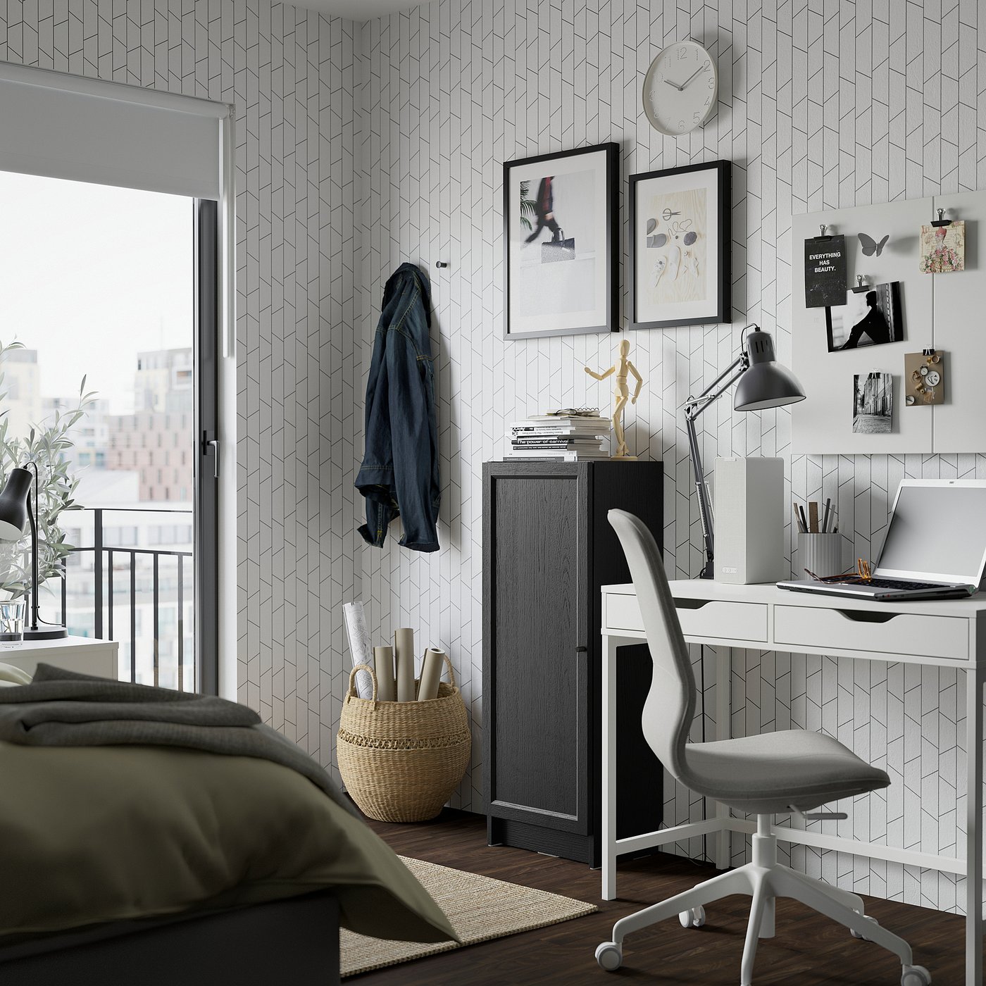 Home office: BILLY bookcase, desk, chair, blanket, laptop, art.