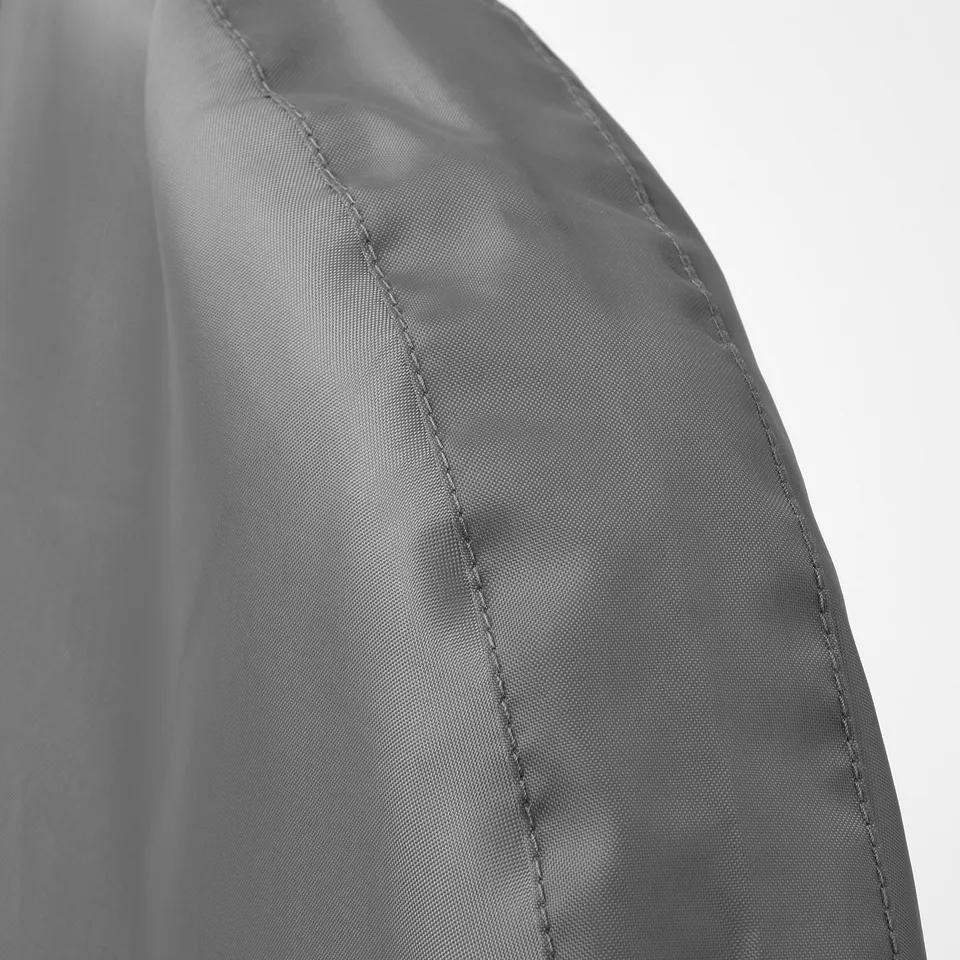 Close-up of durable, grey travel clothes cover with neat stitching, highlighting quality.