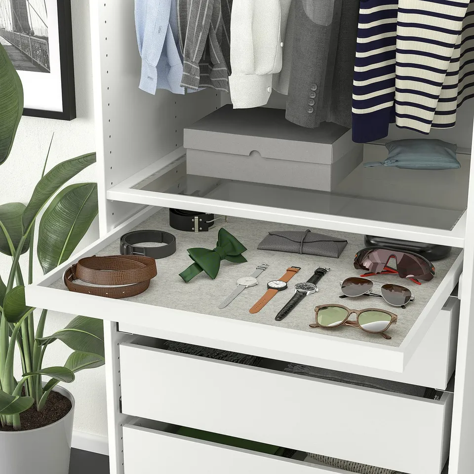 White wardrobe organiser with pull-out tray for accessories. Includes drawer mat and rails.