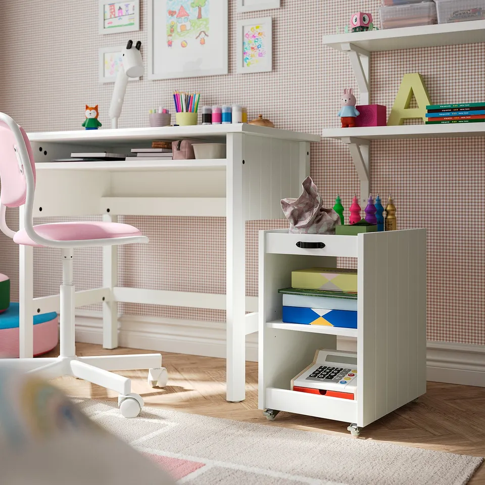 BRYTNING storage unit in white with customizable shelves, fits under desks, lockable castors
