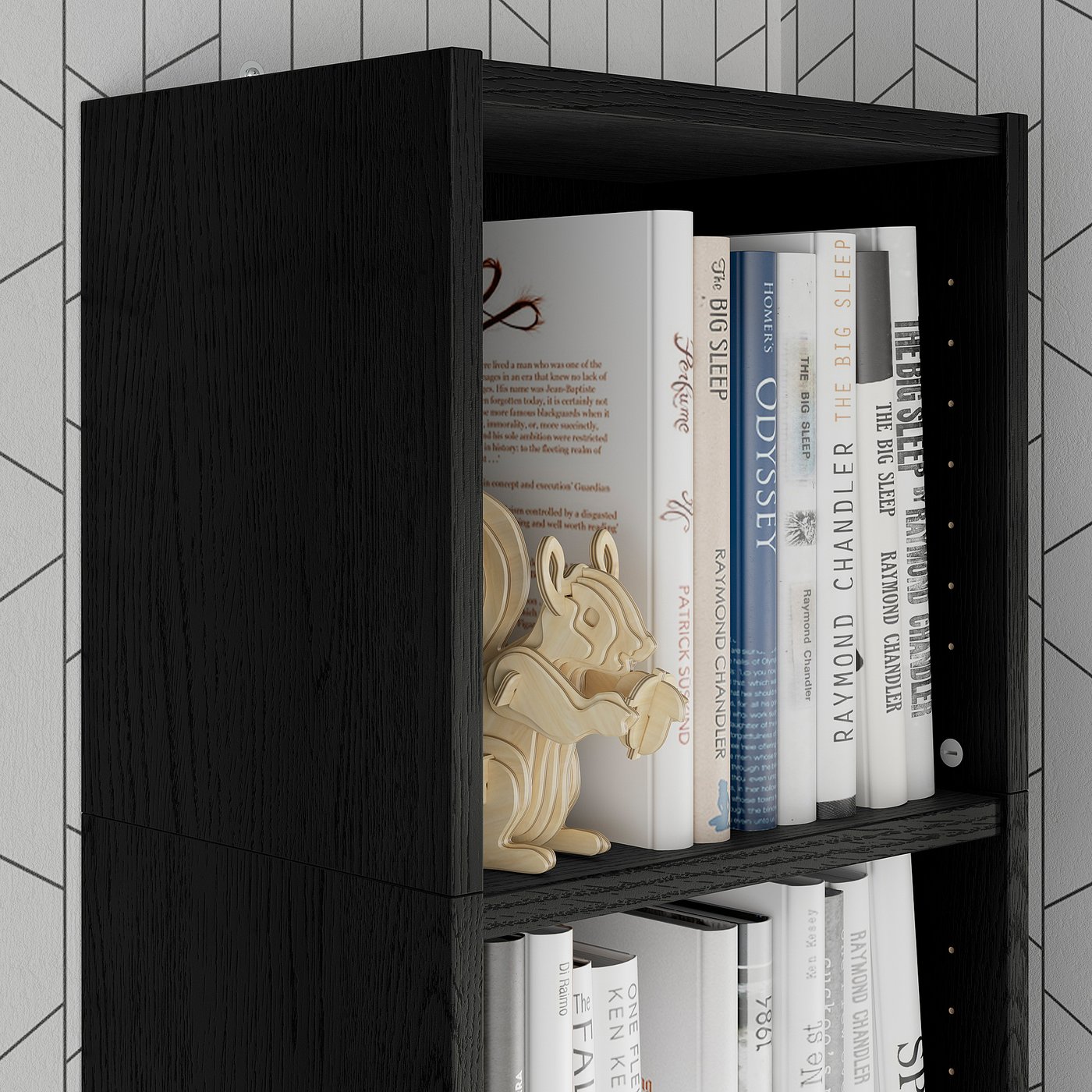 Black bookcase extension with books and wooden figurine. Maximises vertical storage.