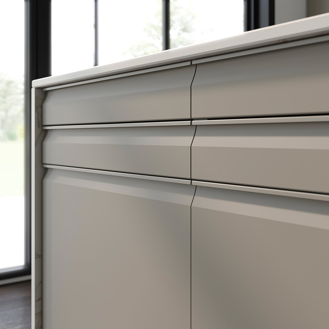 UPPLÖV beige kitchen cabinets with integrated handles.