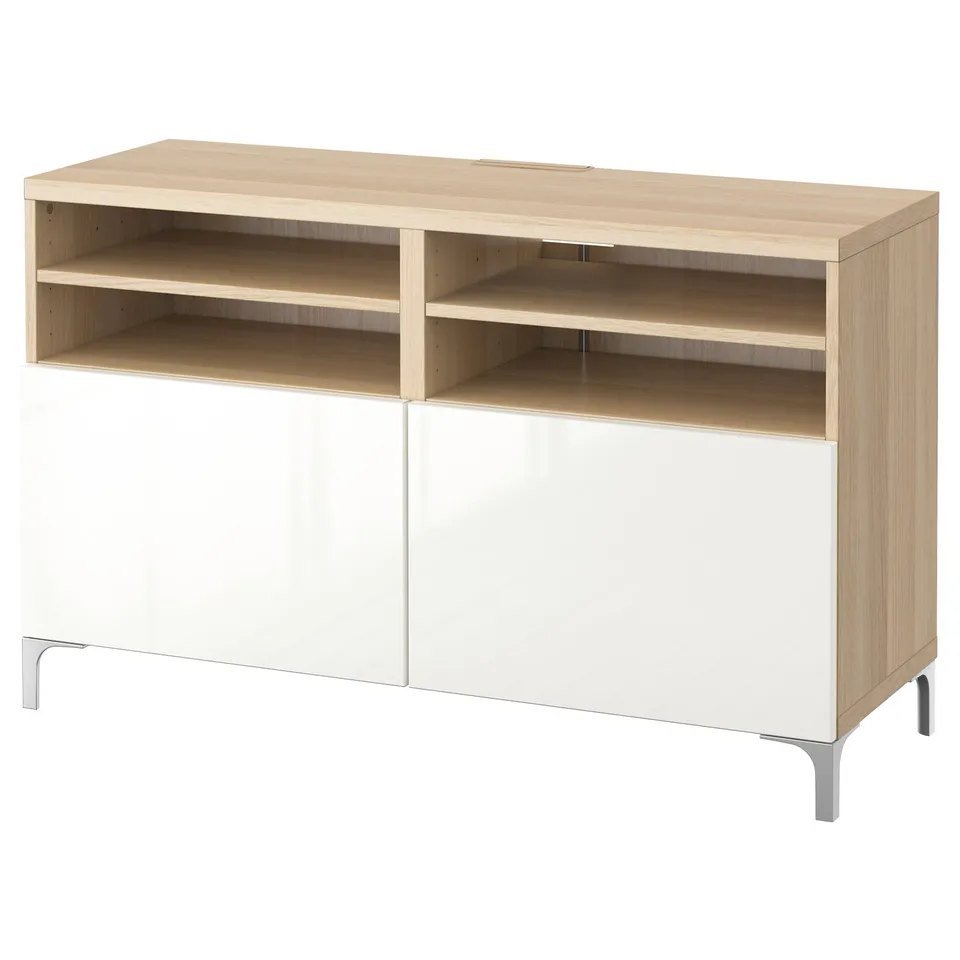 A light-colored wooden tv stand with white storage and open shelves.