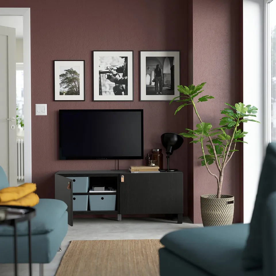 Modern living room with BESTÅ tv unit and mounted tv.