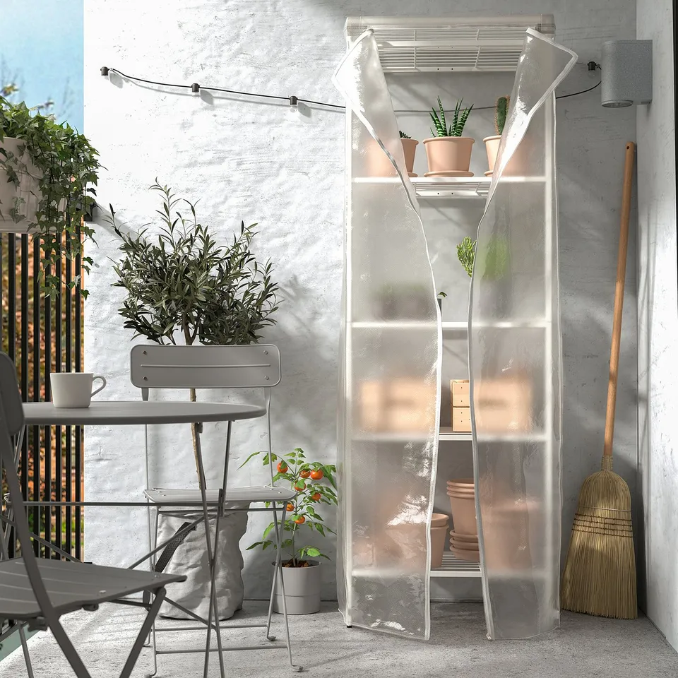 Balcony JOSTEIN storage with plants, clear cover.