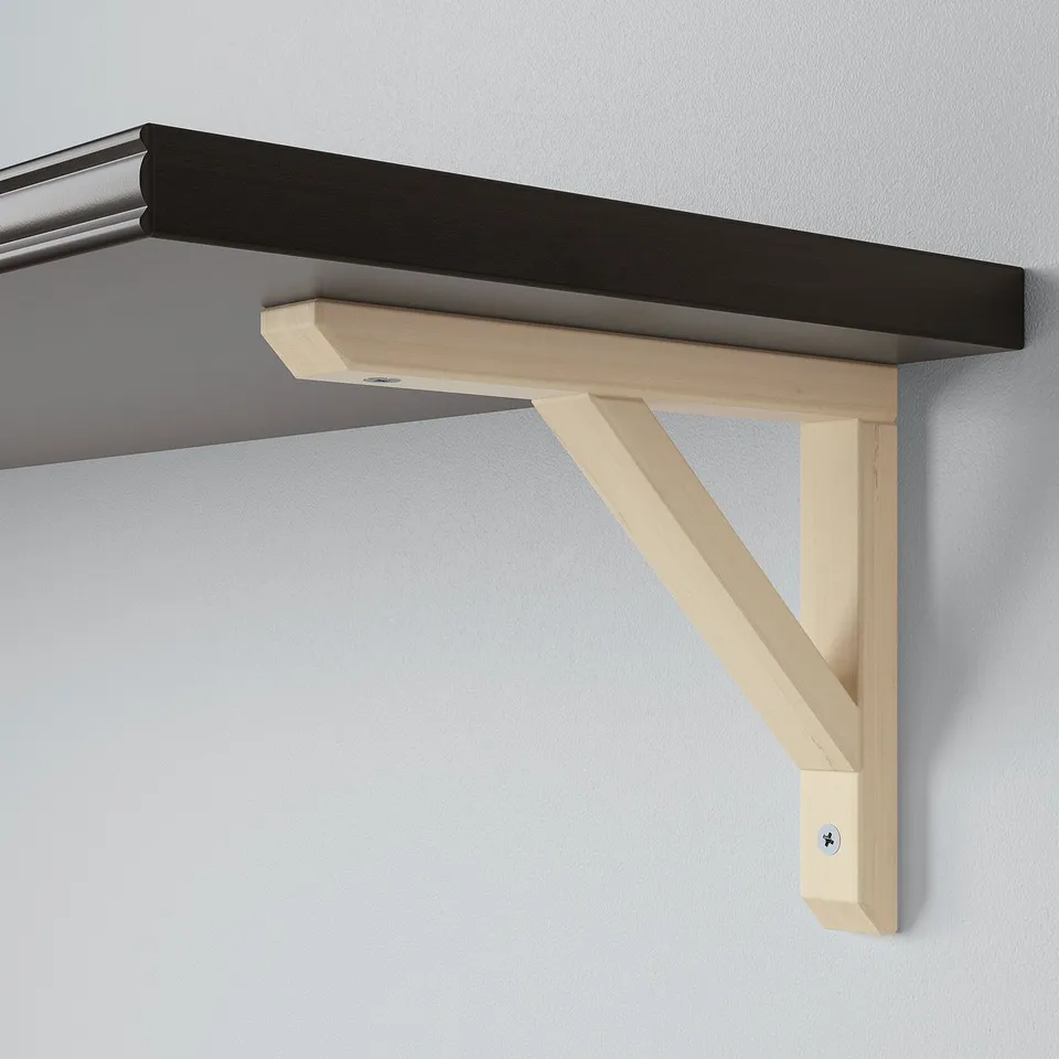 Minimalist wall shelf with light wood bracket, securely mounted on grey wall.