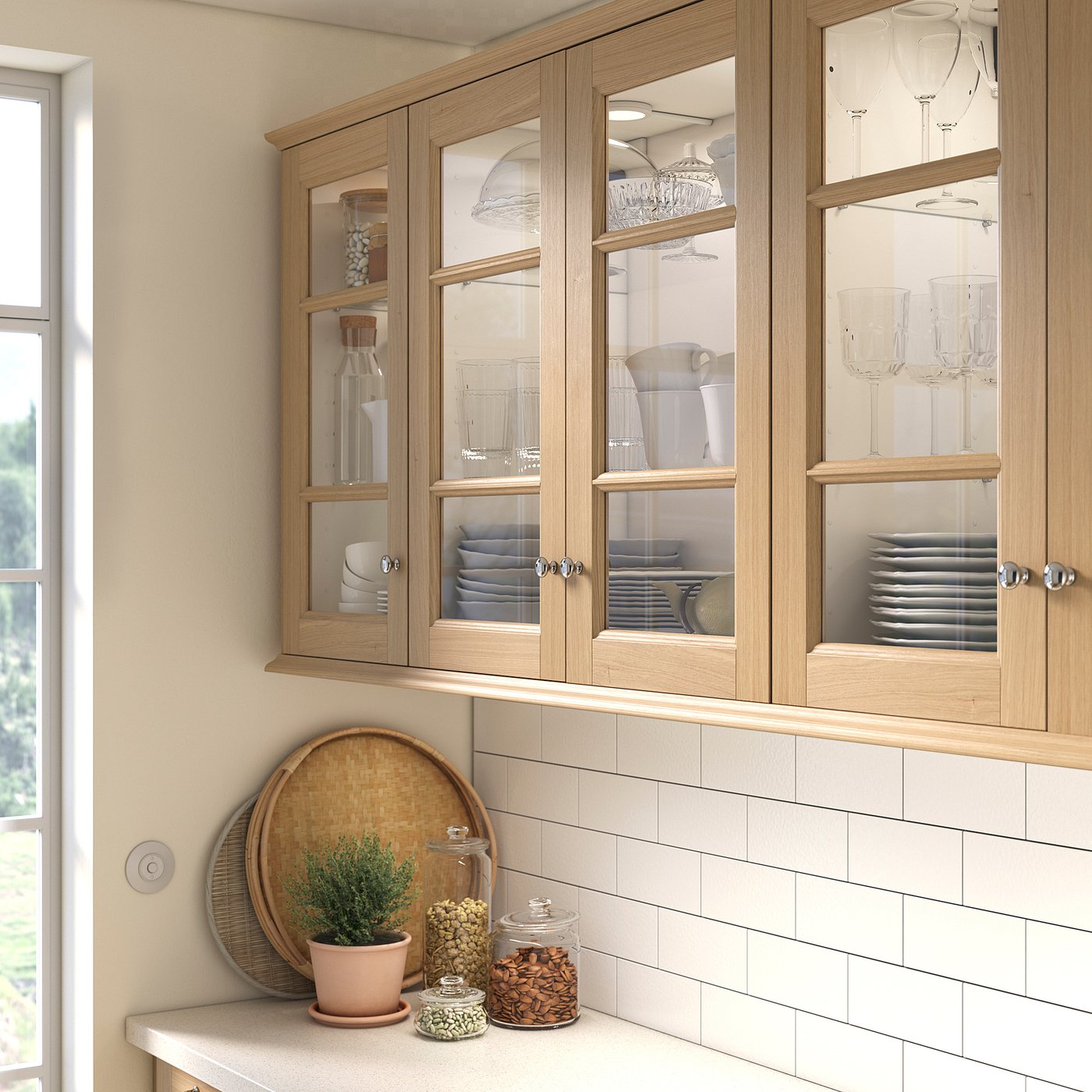Kitchen cabinets with glass panels showcase plates and glasses. Countertop tray, plant, and jars, enhancing a cosy, neat design.
