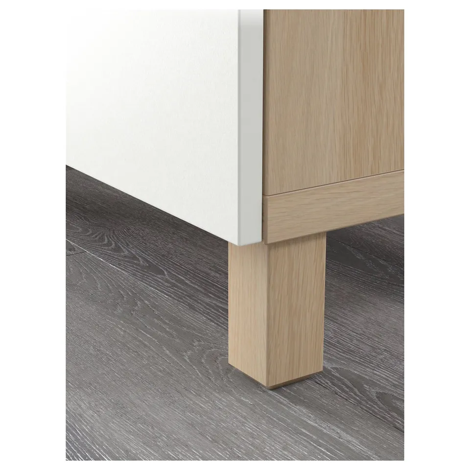 Modern tv stand with light wood finish. Cable management, soft-close hinges, and sturdy oak legs.