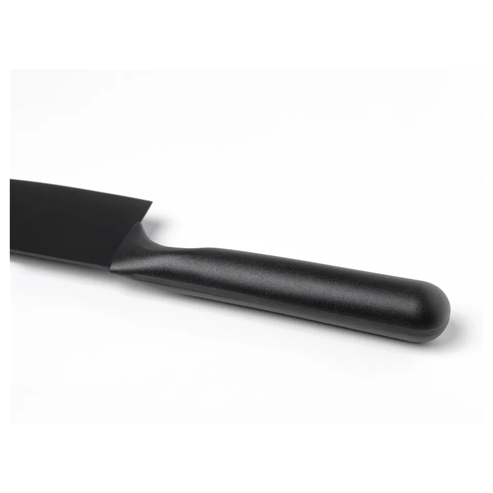 Black kitchen knife with non-stick blade and ergonomic handle, showcasing quality materials and design.