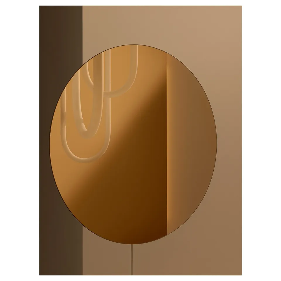 VARMBLIXT lamp with bronze glass and mirror, creating warm and natural light. Round shape and dimmable led.