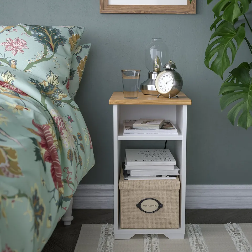 SKRUVBY white side table, small, beside bed, books, clock, lamp, plant, floral bedding.
