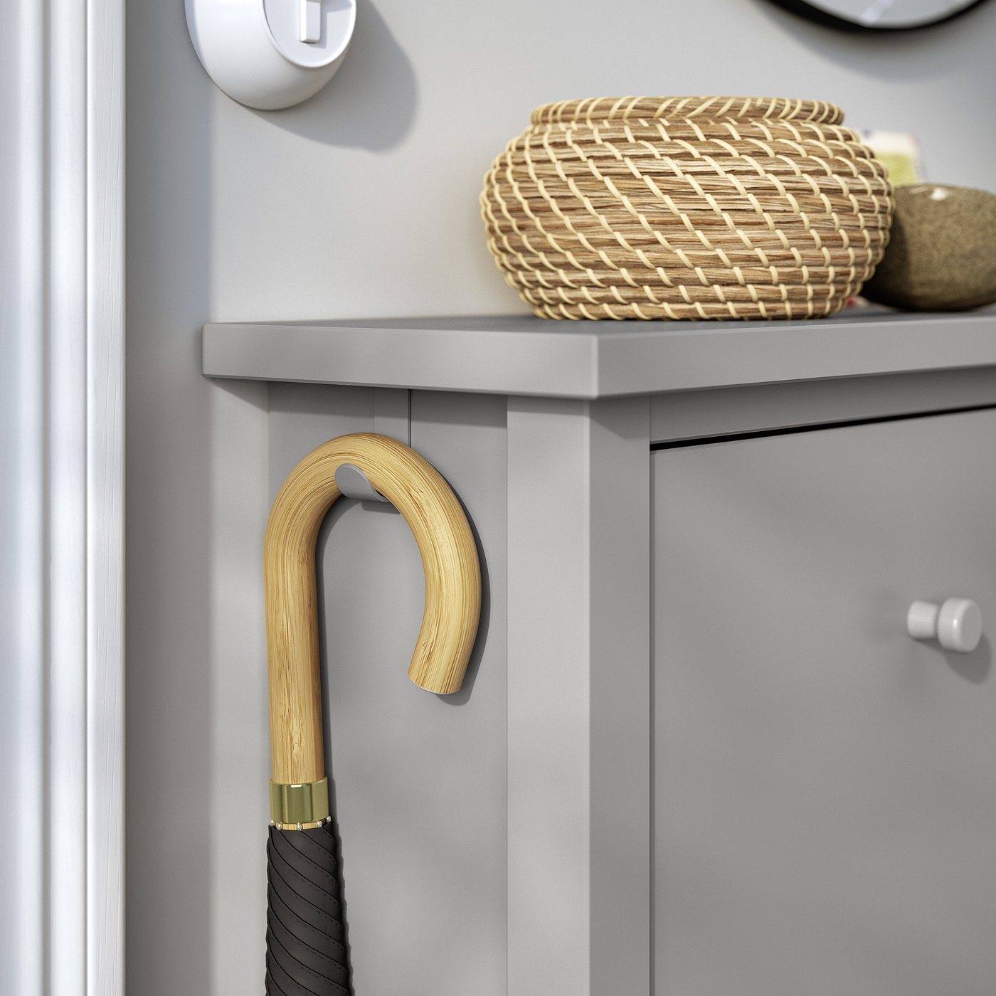 Narrow grey wooden shoe cabinet with 4 compartments, single hook each side, shallow design.