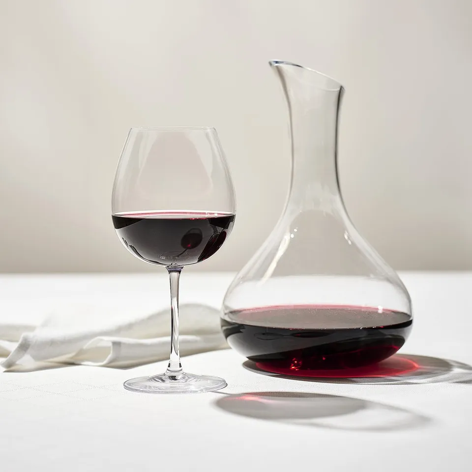 Wine glass & decanter enhancing flavours on table