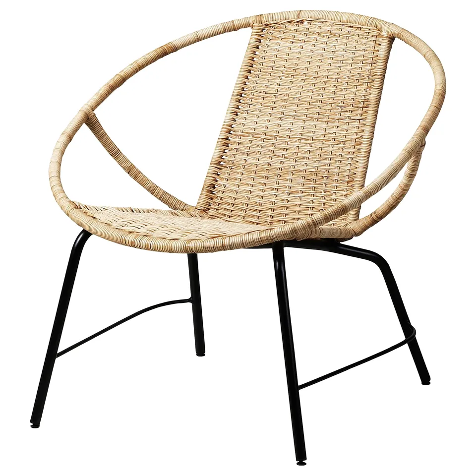 ORRESLÄTT chair: natural woven rattan on black steel legs, circular back, minimalist design.