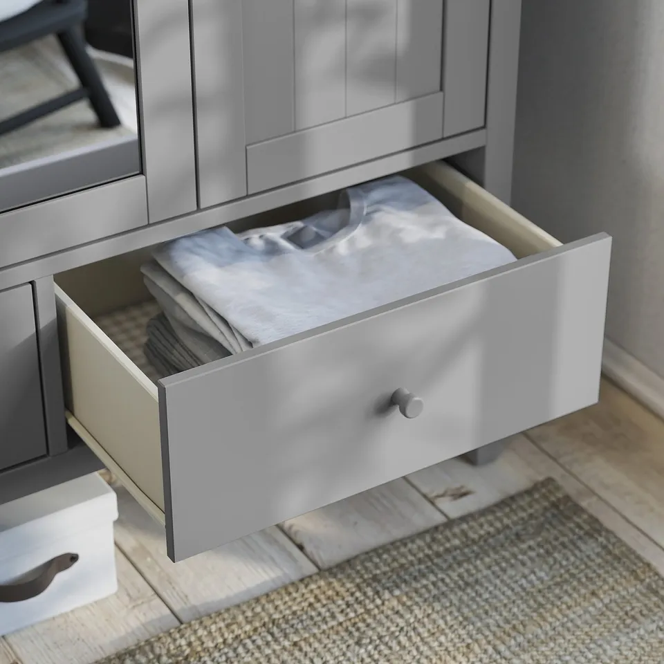 Grey GULLABERGh wardrobe with open drawer and mirror.