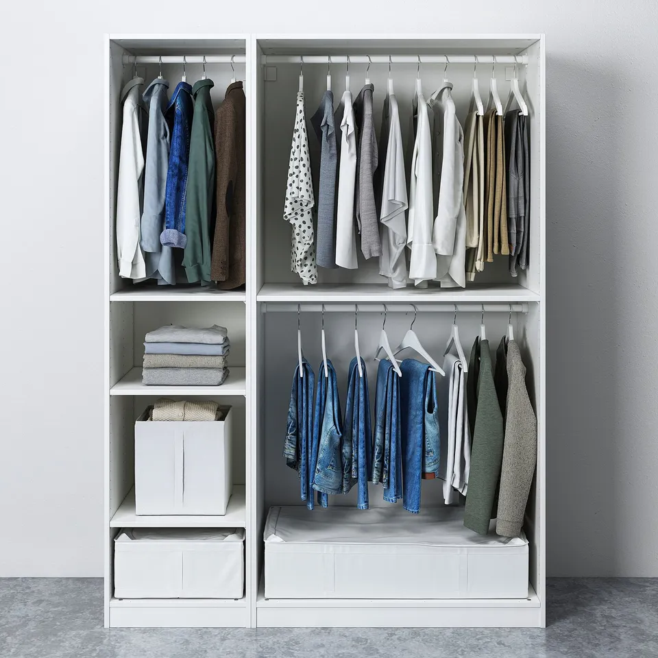 White PAX wardrobe with shelves, rails, and boxes.