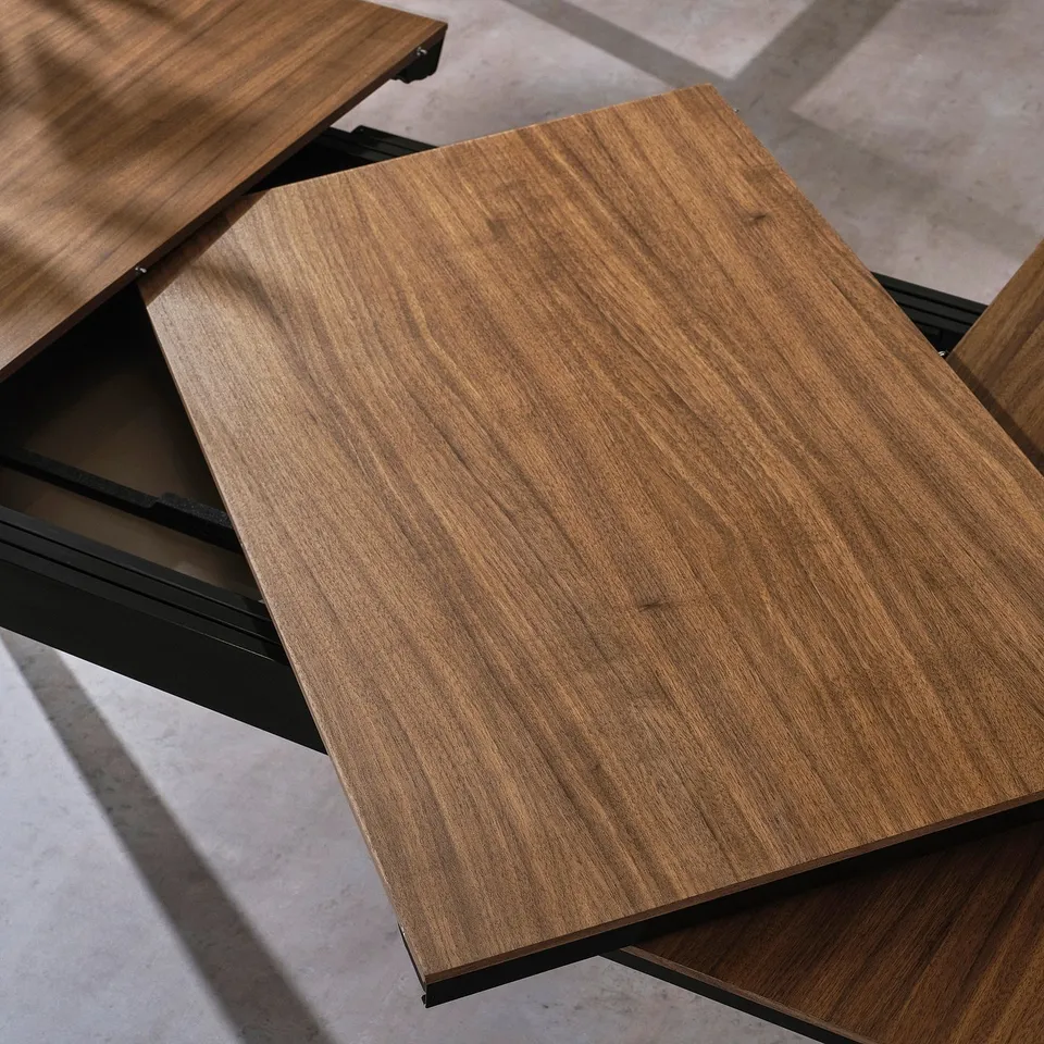 Wooden tabletop with extensions for seating 4-8 people.