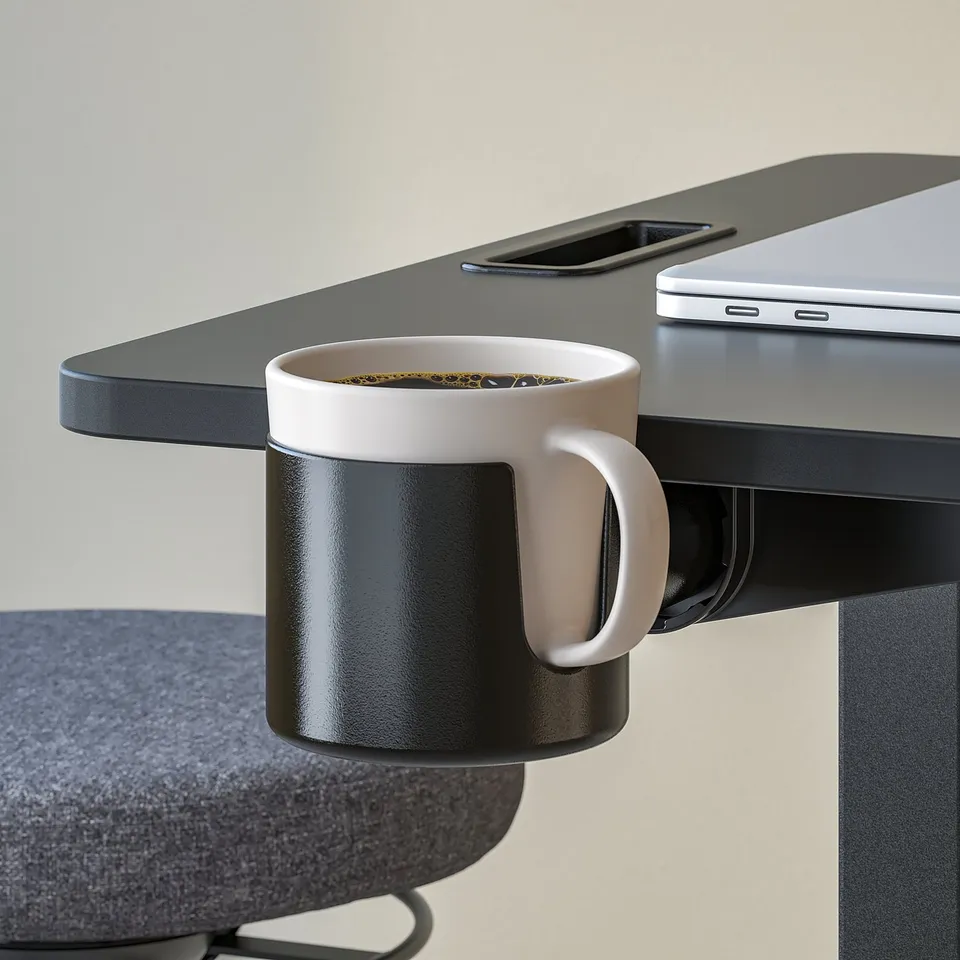 Adjustable laptop table with mug holder. Coffee cup placed in holder under tilted tabletop.