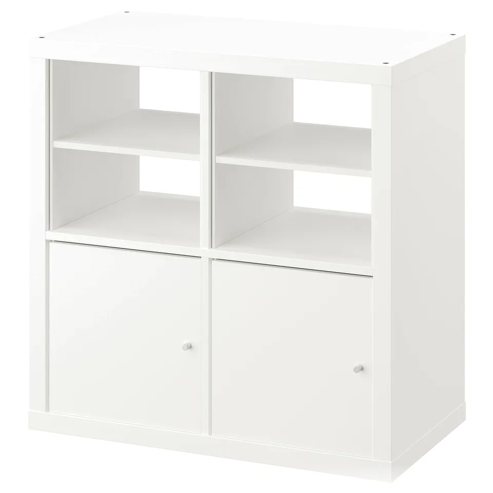 White KALLAX shelving unit with open and closed compartments.