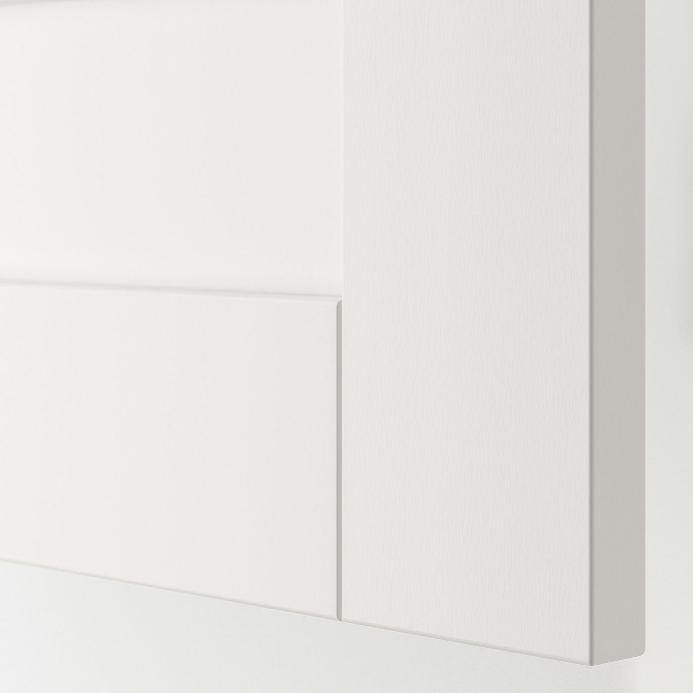Smooth white cabinet detail, quality finish.