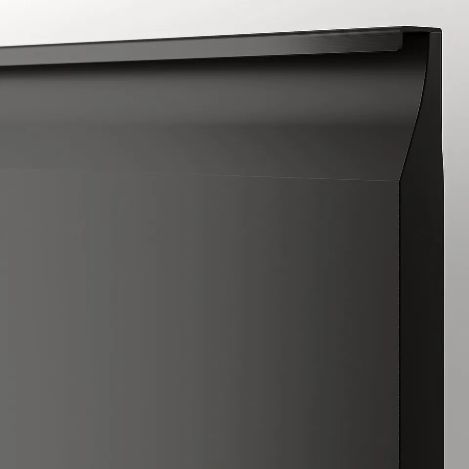 Close-up of sleek, modern black storage unit. High-quality materials, smooth finish, and sturdy construction evident.