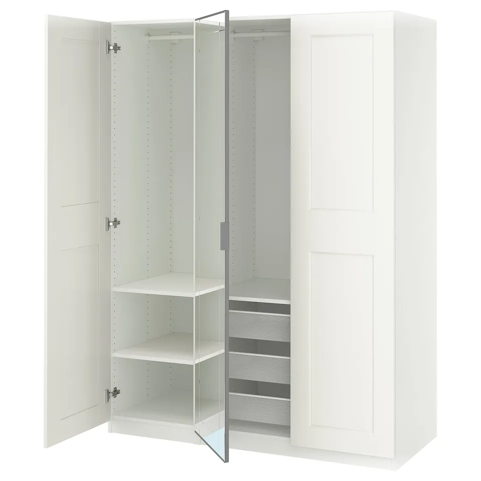 White PAX wardrobe with mirror doors and adjustable shelves.