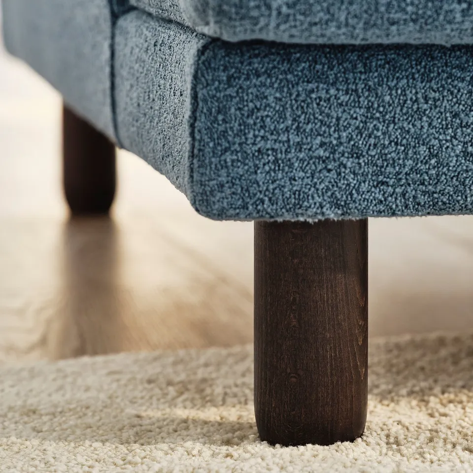 UPPÅKRA sofa, quality close-up. Showcasing robust dark wood leg, sturdy upholstery, and soft texture.