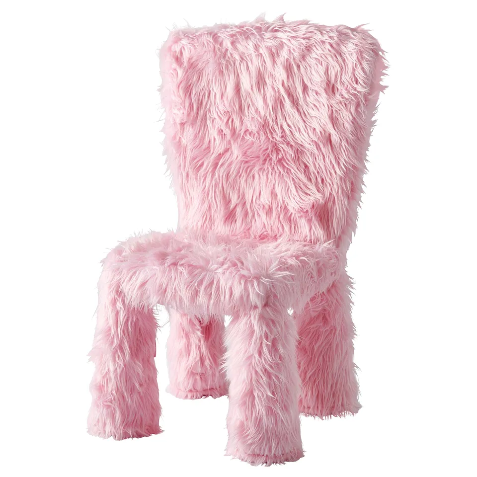 Pink fuzzy chair with tall back and armrests, cosy and inviting design.