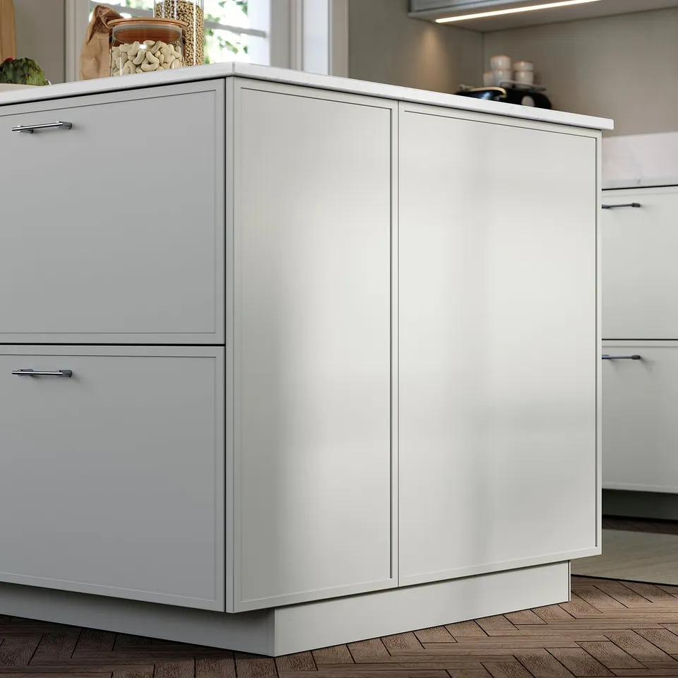 Kitchen island with light grey cabinets & thin frame cover panel.