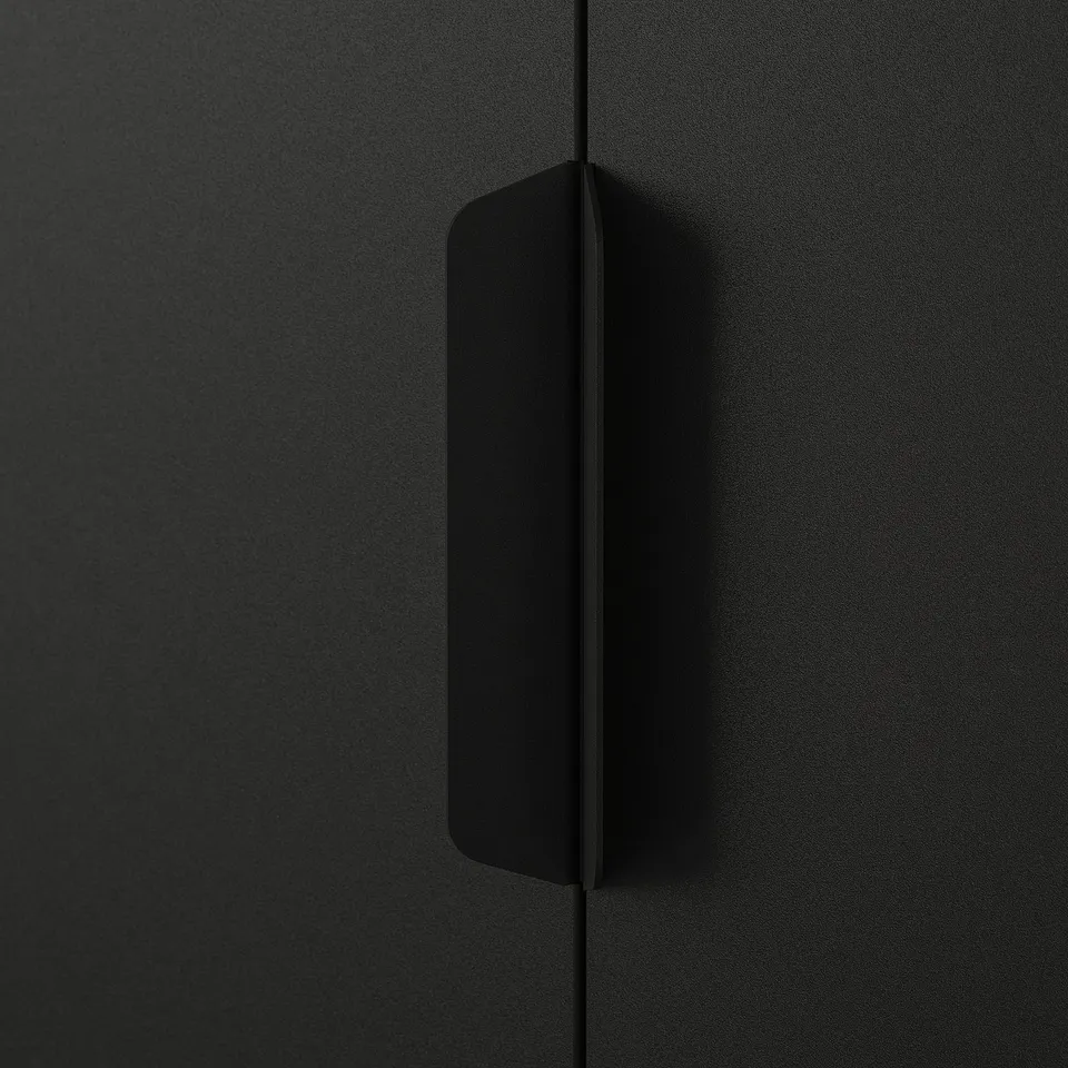 Modern black metal drawer with sleek handle; sturdy, minimalist design.