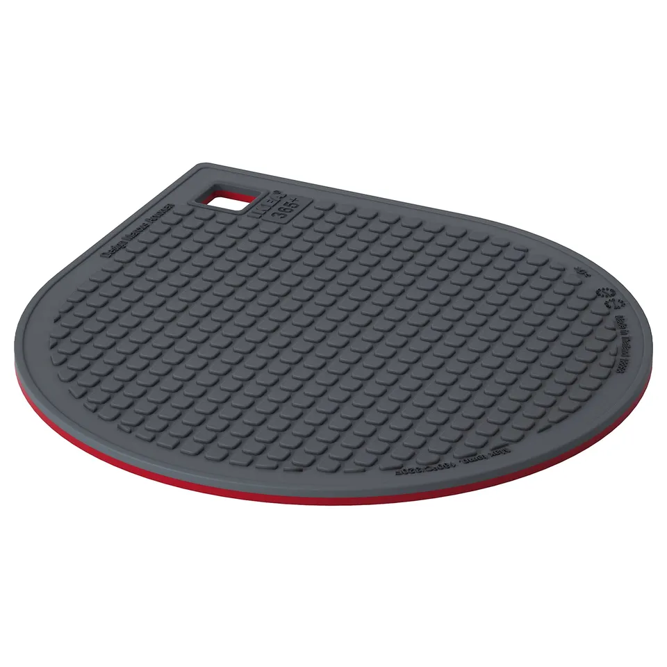 IKEA circular magnet mat, red and black, textured surface for gripping, flat design.