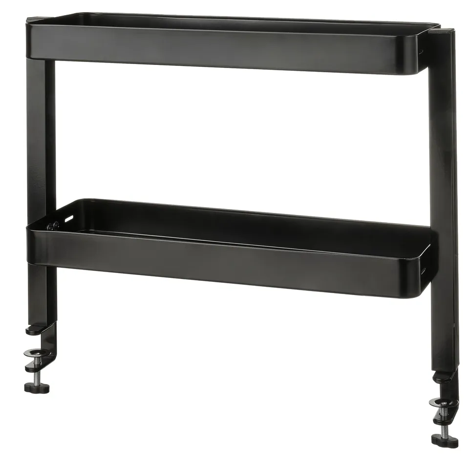 Black metal 2-tier VATTENKAR shelving unit with clip-on mounts, suitable for tables.