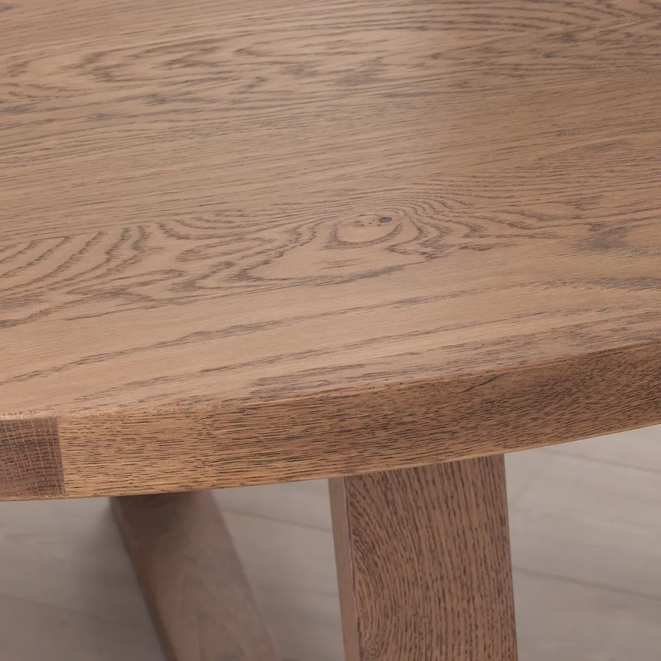 Close-up of high-quality oak tabletop with natural grain detail.