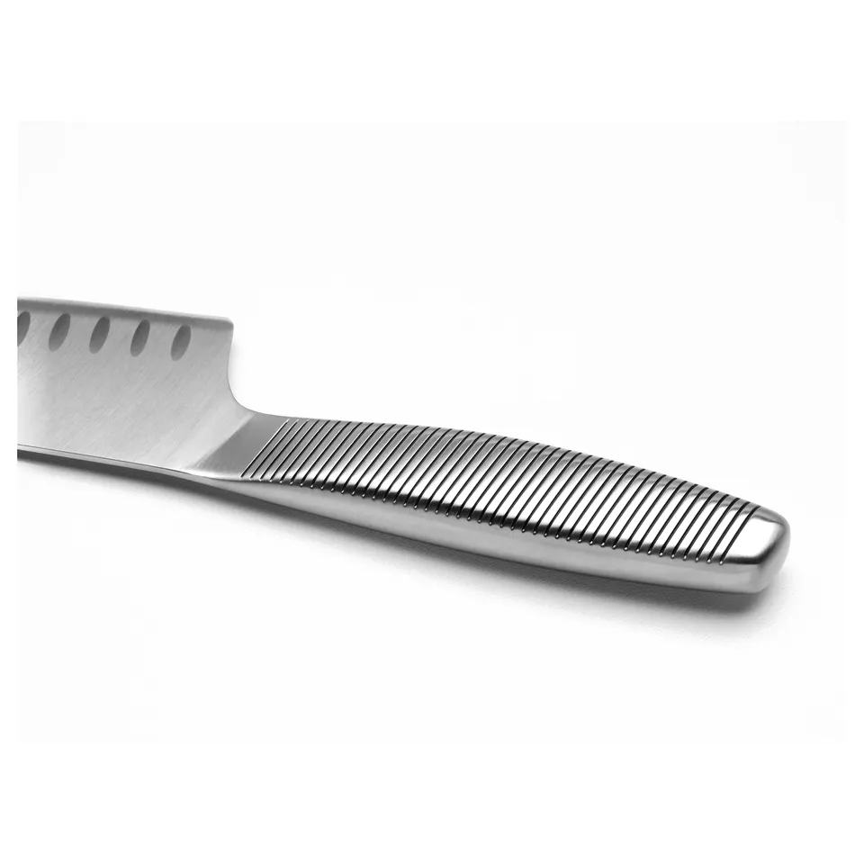 Stainless steel knife with serrated blade and grooved handle, designed for durability and comfortable grip.