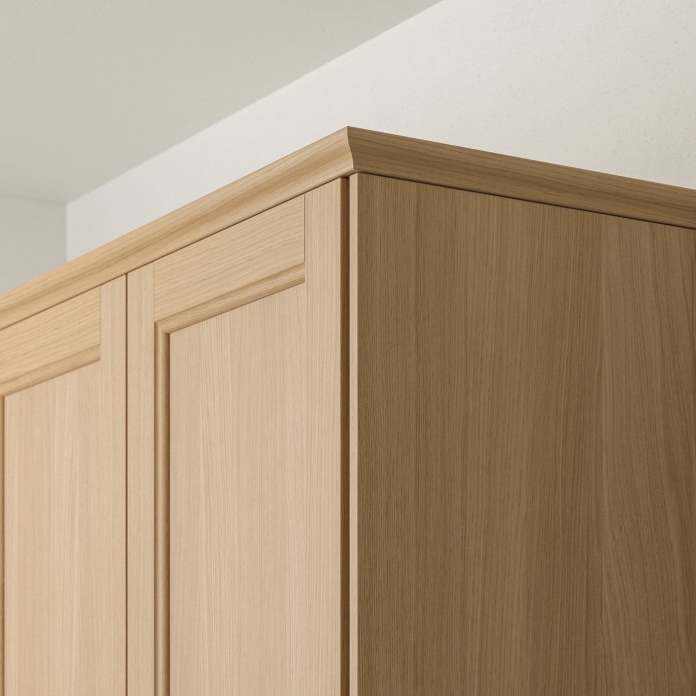 Wooden kitchen cabinet trim in oak finish, showcasing robust design suitable for hiding lighting and cords.
