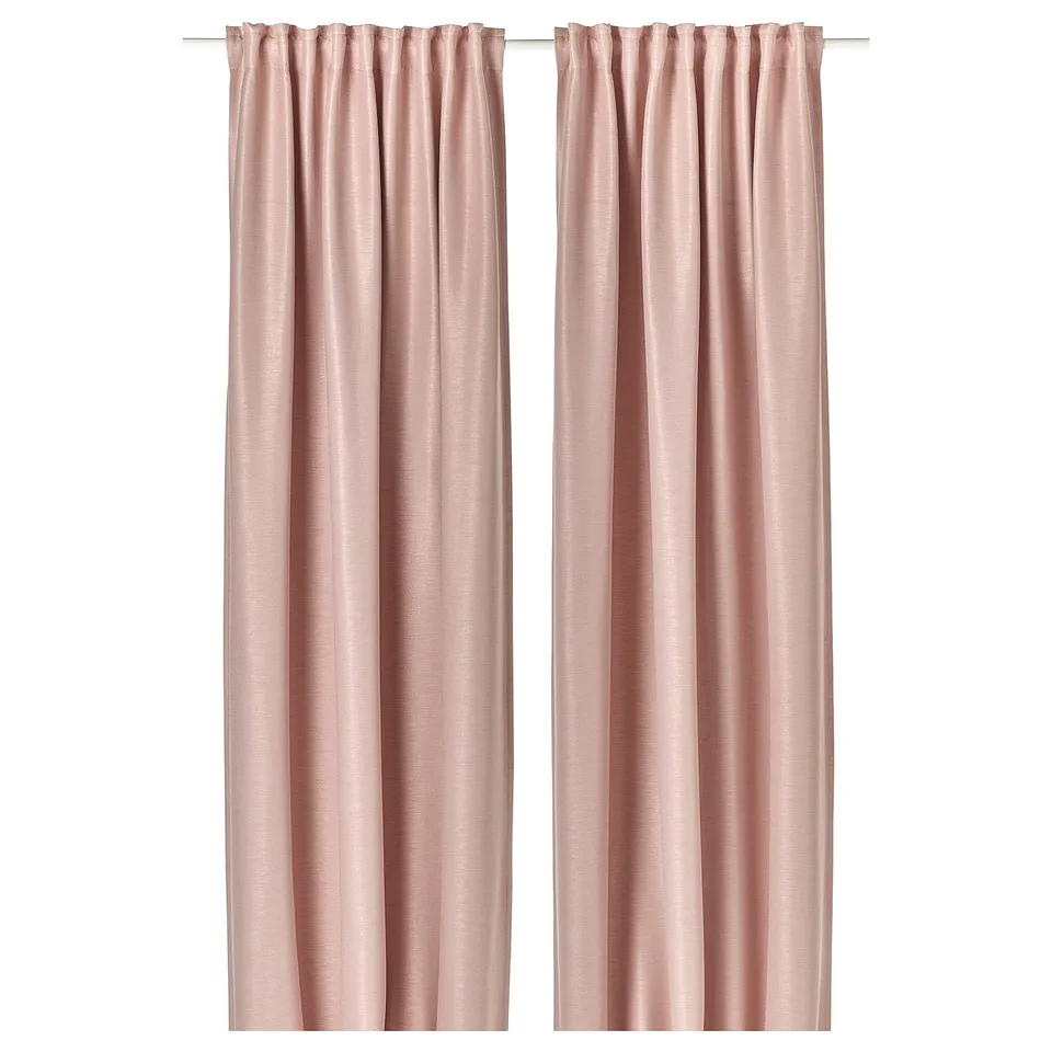 Pink VILBORG curtains hang side by side, sleek, modern with linear texture, room-darkening.